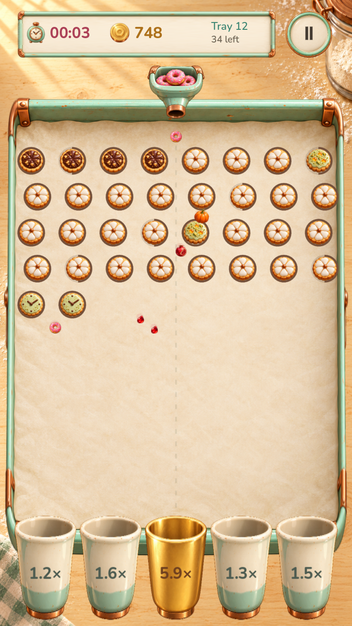 Sugarfall gameplay with sweet treats bouncing into reward cups